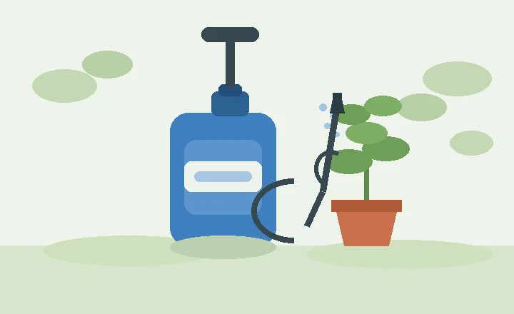 A hand pump garden sprayer with wand and nozzle beside a small potted plant